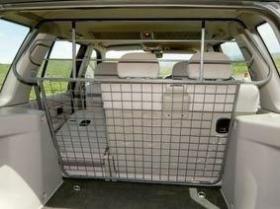 LAND ROVER 90F001 - SEPARADOR DE CARGA O ANIMALES FREEELANDER